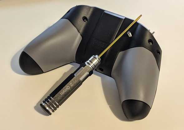 hex head screwdriver lying on top of the back of the X-Lite