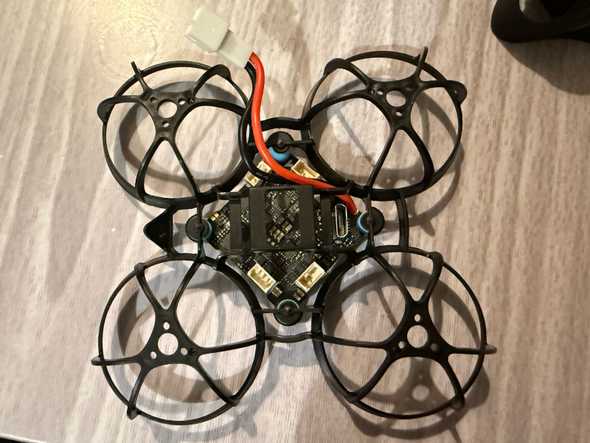flight controller assembled with frame, shot from below