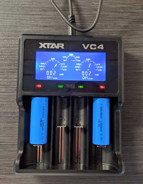 Xtar battery charger charging a pair of 18500 batteries